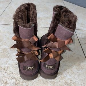 Never been worn Ugg Ankle with bow ties Brown